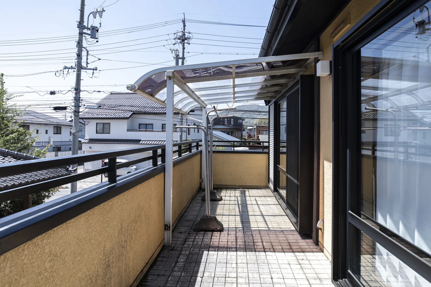 洋室から直結するGuest House Masaruのベランダ